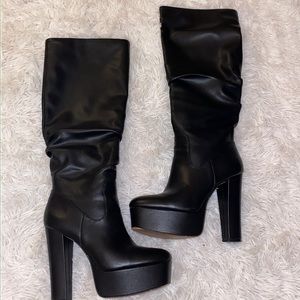 Knee high black JLO boots!